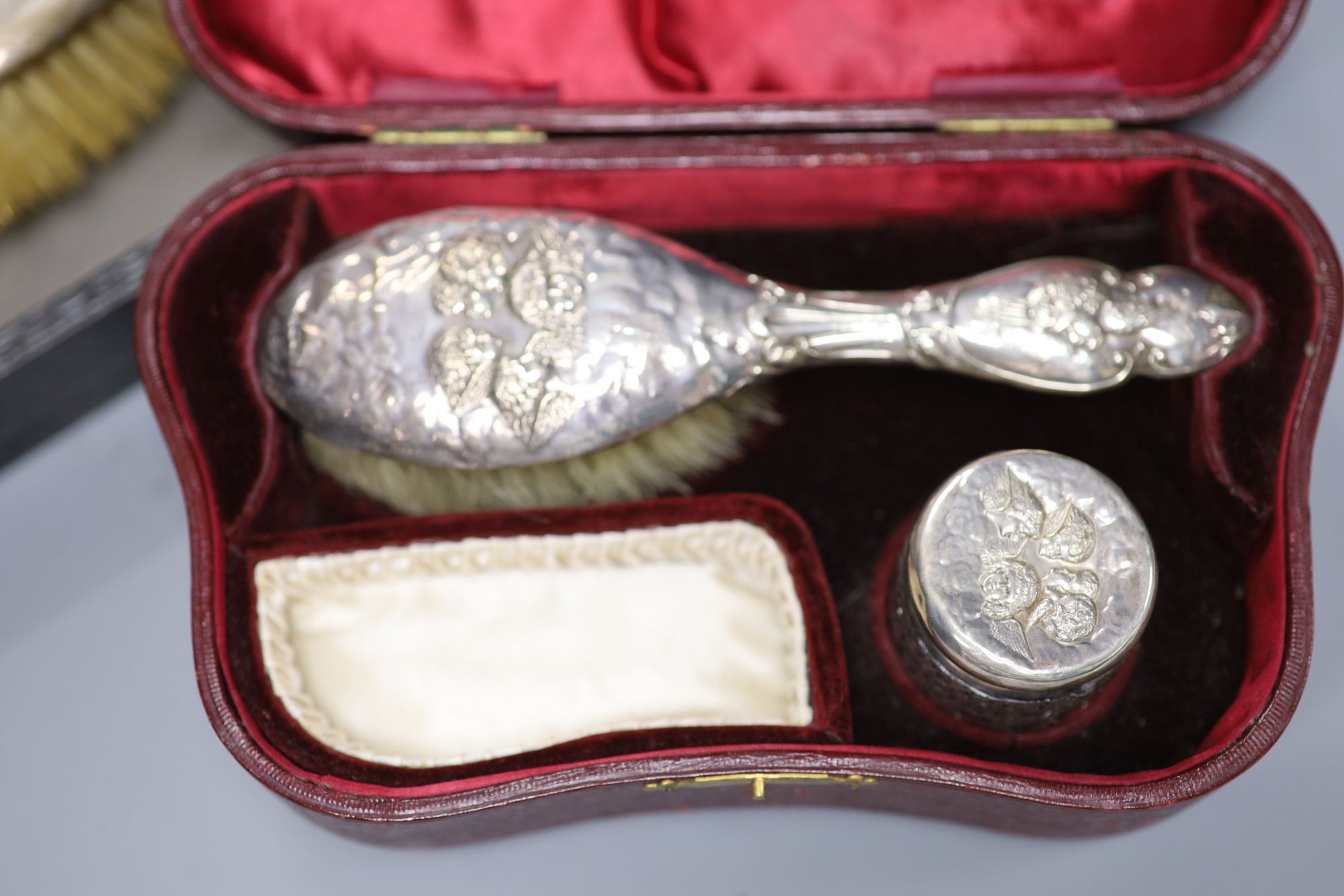 Two cased silver dressing table sets